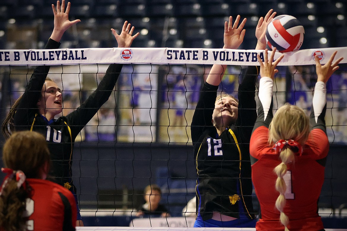 Blakely Lakko (12) makes a block at the net as teammate Ellie Baxter (10) looks on as Thompson Falls battled Glasgow at the All-Class State Volleyball Tournament in Bozeman Friday, Nov. 11. (Jeremy Weber/Daily Inter Lake)