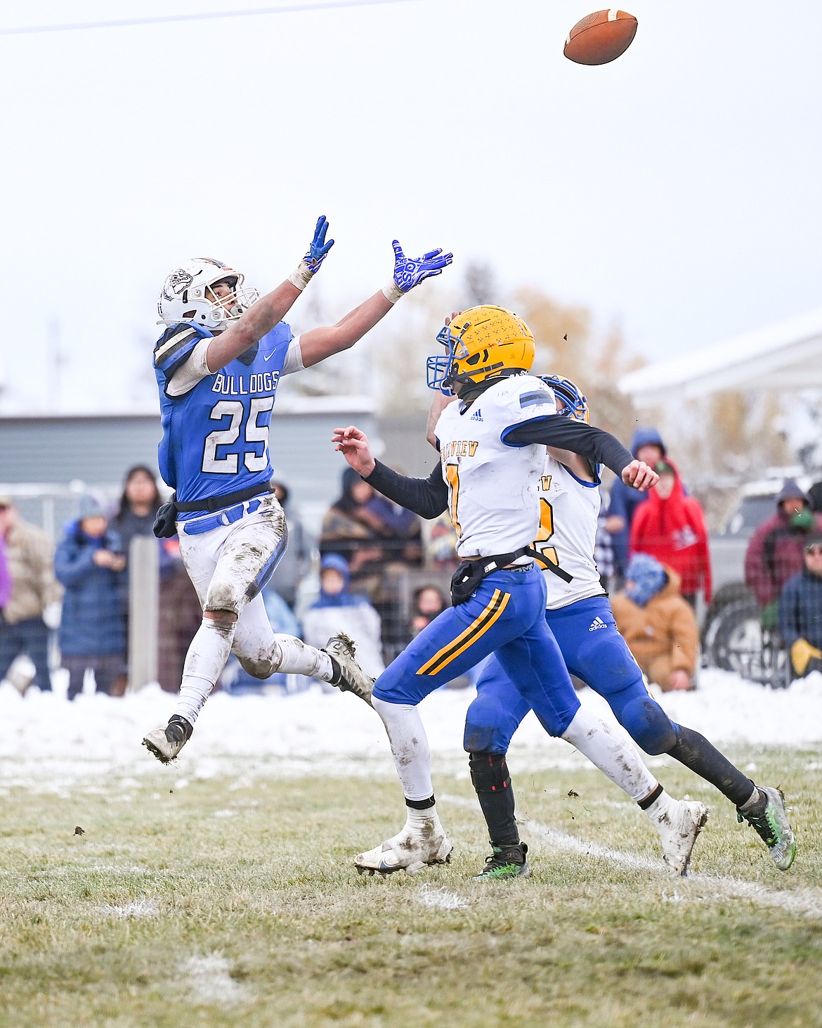 Bulldog Kenny Ness stretches for the pass in last Saturday's game. The triumphant Bulldogs take on the undefeated Belt Huskies at 1 p.m. Saurday in St. Ignatius in the state championship. (Christa Umphrey photo)