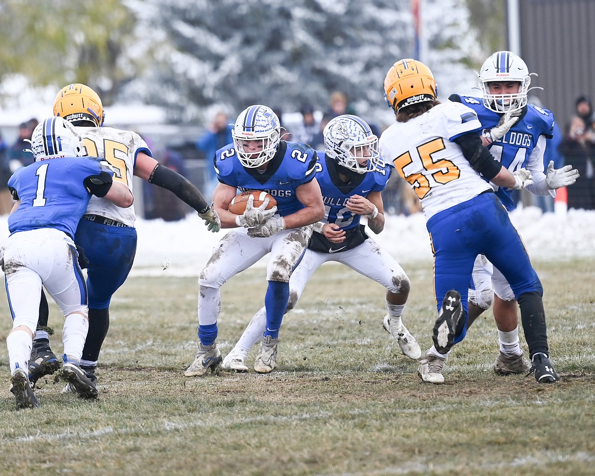 Mission's Canyon Sargent clutches the ball during 2022 match up with Fairfield. (Christa Umphrey photo)