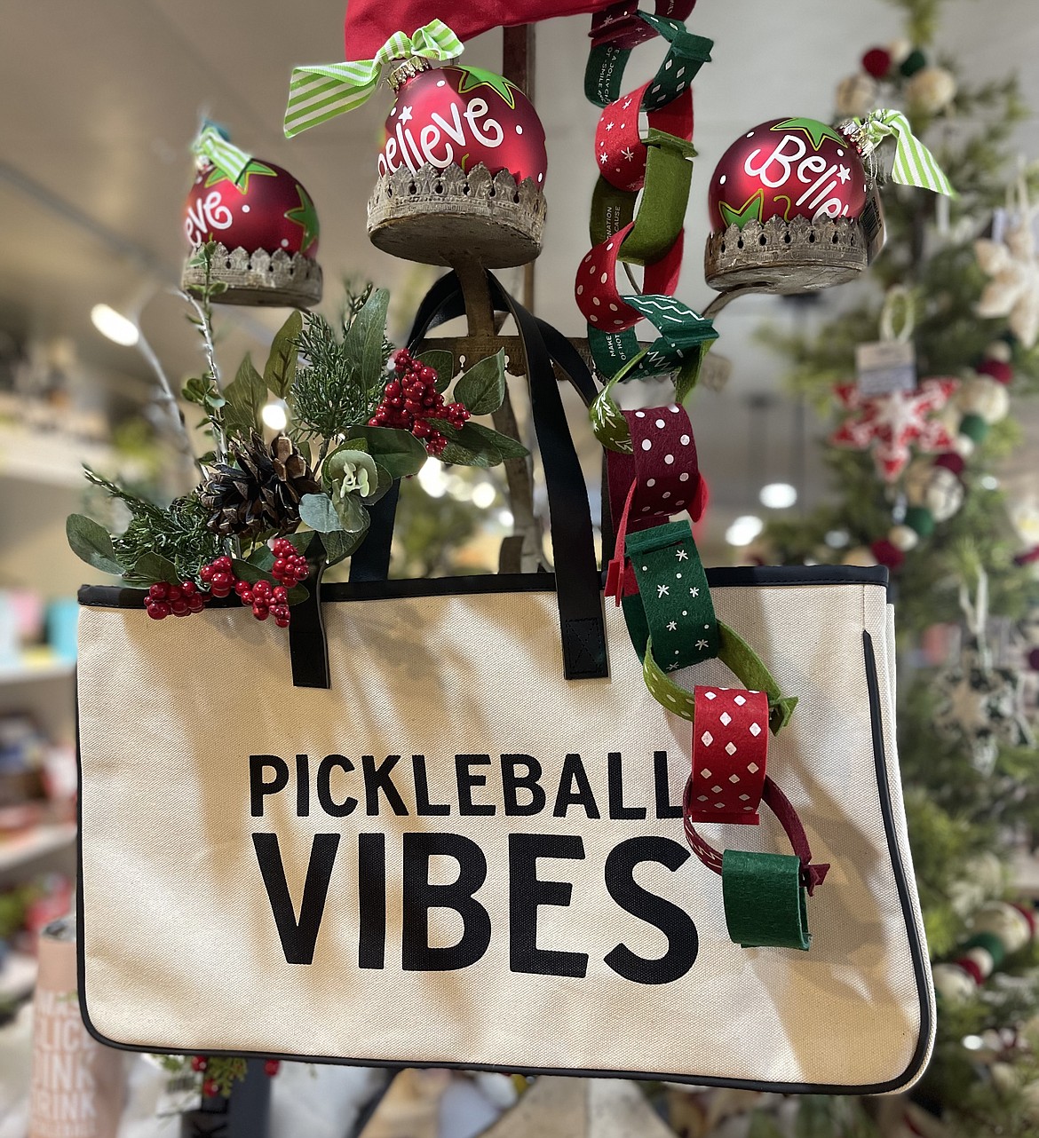 Pick Pickleball totes from Mix it Up as great gifts for a white elephant or office party. Mix it Up has gifts for everyone on your list ranging in price and style with a local flare.