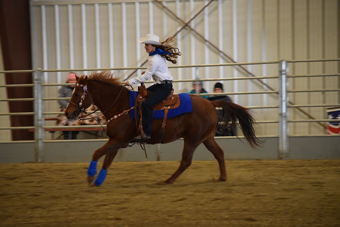 Miss Moses Lake Roundup contestant Milie Cobb demonstrates her horsemanship skills on Saturday morning.