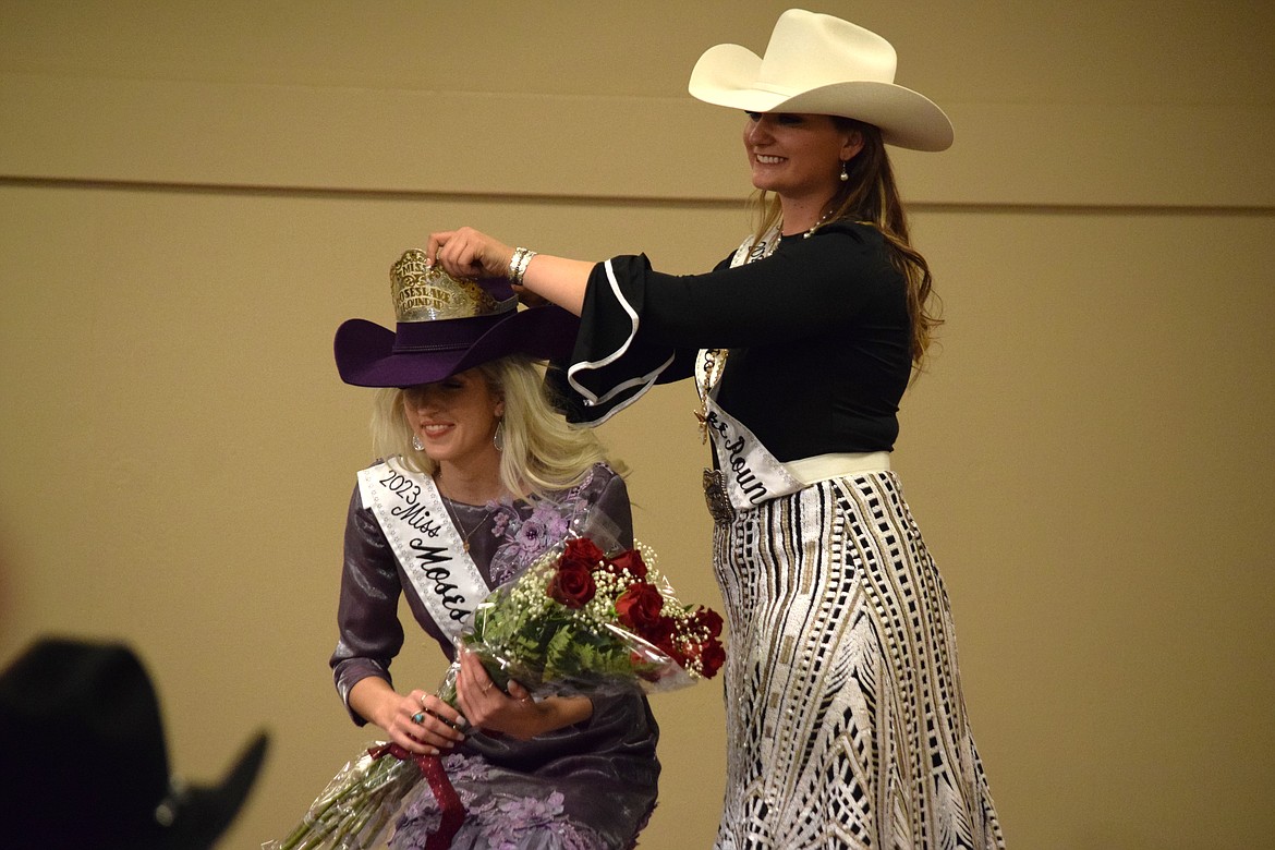 Outgoing Miss Moses Lake Roundup Brianna Kin Kaid crowns Annabelle Booth as Miss Moses Lake Roundup for 2023.