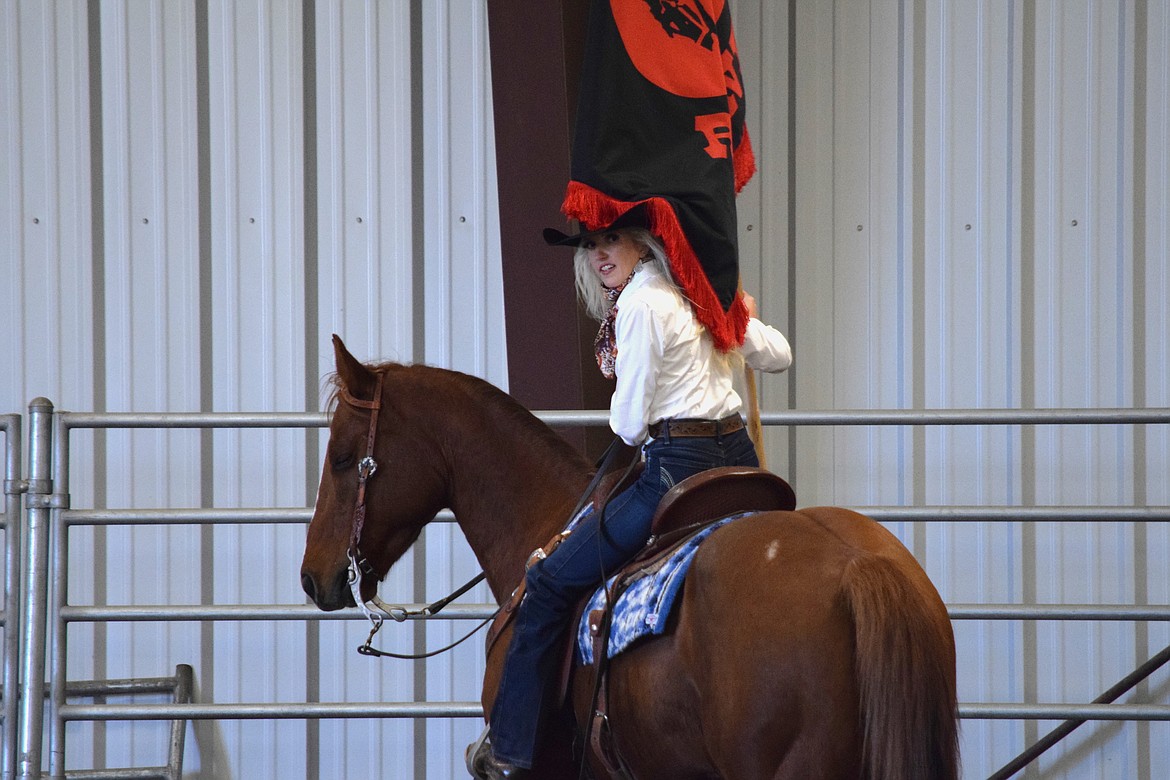 Annabelle Booth, Miss Moses Lake Roundup 2023, looks back at the judges as she finishes riding a pattern with the Moses Lake Roundup flag during Saturday morning’s horsemanship portion of the Miss Moses Lake Roundup pageant. Booth was formerly Last Stand Rodeo Coulee City 2019.