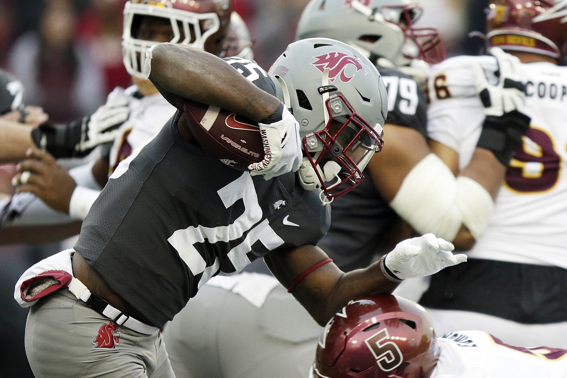 Since returning from an injury suffered against USC, Cougar running back Nakia Watson (25) has helped provide a spark to the formerly struggling WSU run game.