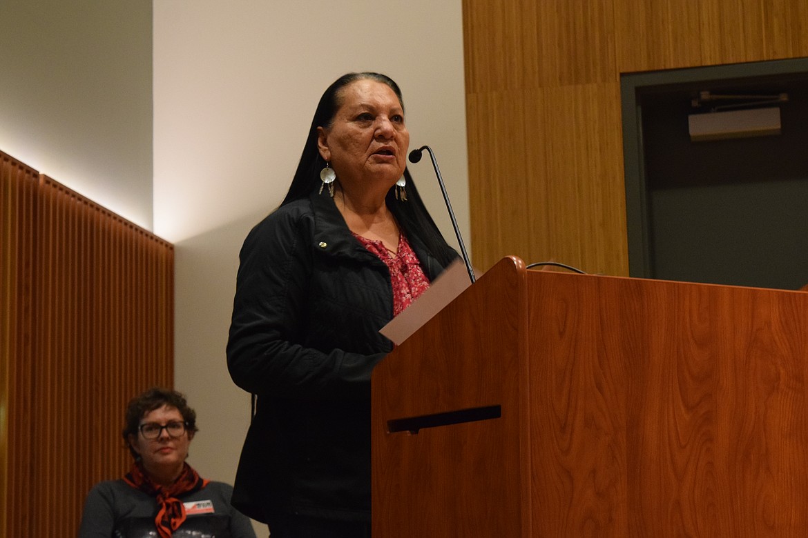 Confederated Tribes of the Colville Reservation Business Council member Karen Condon speaks during the land acknowledgment ceremony in the auditorium of the Moses Lake Civic Center on Tuesday.