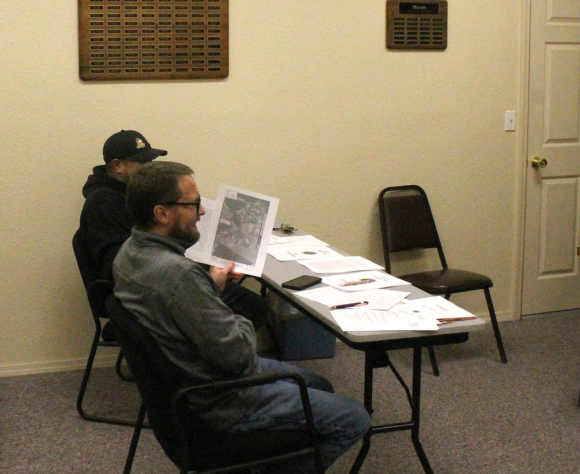 Royal City Finance Director Shilo Christensen points out items in the city’s 2023 budget to the city council Tuesday.