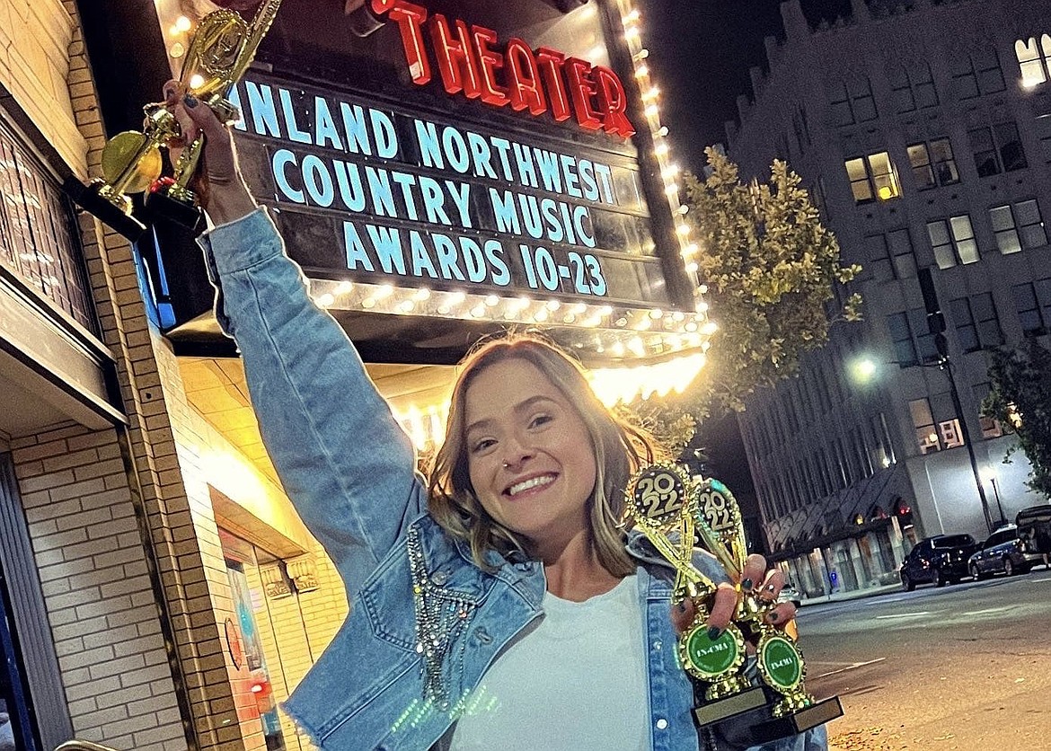 Carly Osika shows off her hardware from the IN-CMAs, where she was chosen as Favorite Solo Act.