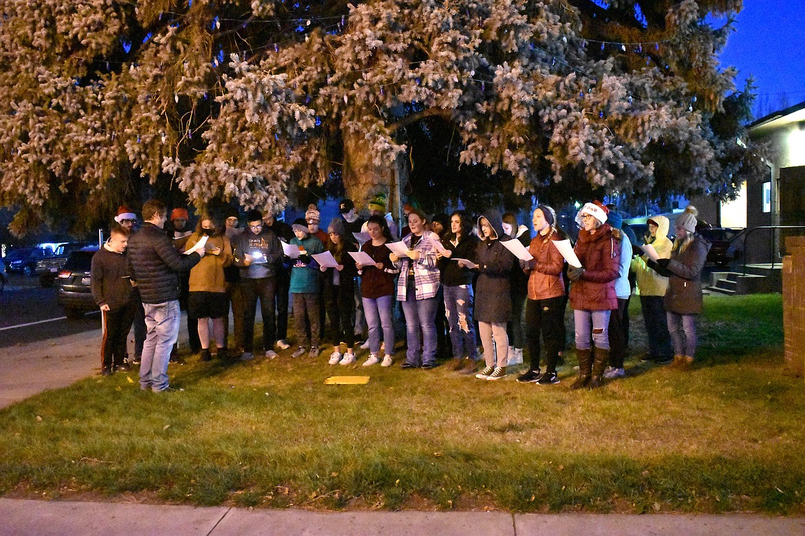 The Ephrata High School choir performs just before the community Christmas tree is lit during the community’s 2021 holiday celebration.