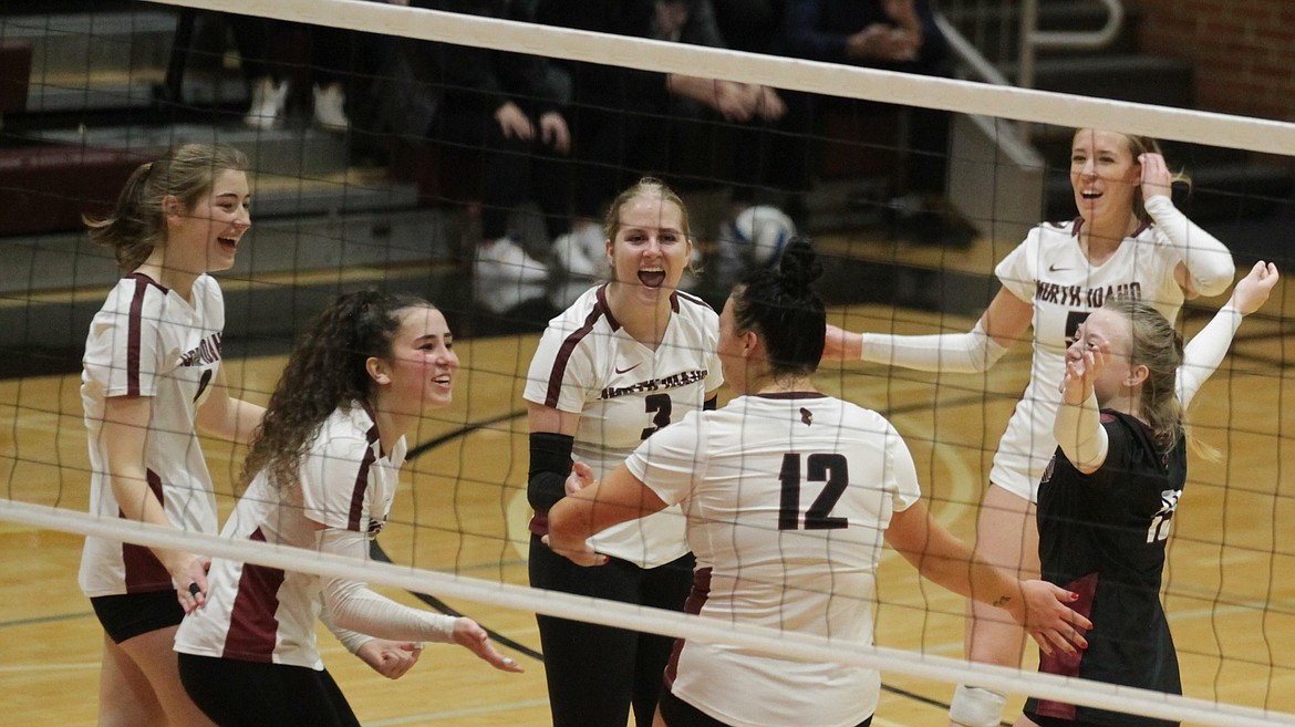 JASON ELLIOTT/Press
Members of the North Idaho College volleyball team Rylee Hartwig (9), Abigail Neff (1), Paige Dreschel (3), Rachael Stacey (5), Brooklyn Minden (13) and Taylin Rowley (12) celebrate a point in the third set of last Saturday's match against Tacoma at Christianson Gymnasium. Hartwig (Post Falls High), Neff (Lakeland), Dreschel (Coeur d'Alene), Minden (Post Falls) and Rowley (Coeur d'Alene) have been key pieces in the Cardinals run to the Elite 8 of the Northwest Athletic Conference championships, which resume today in Lakewood, Wash.