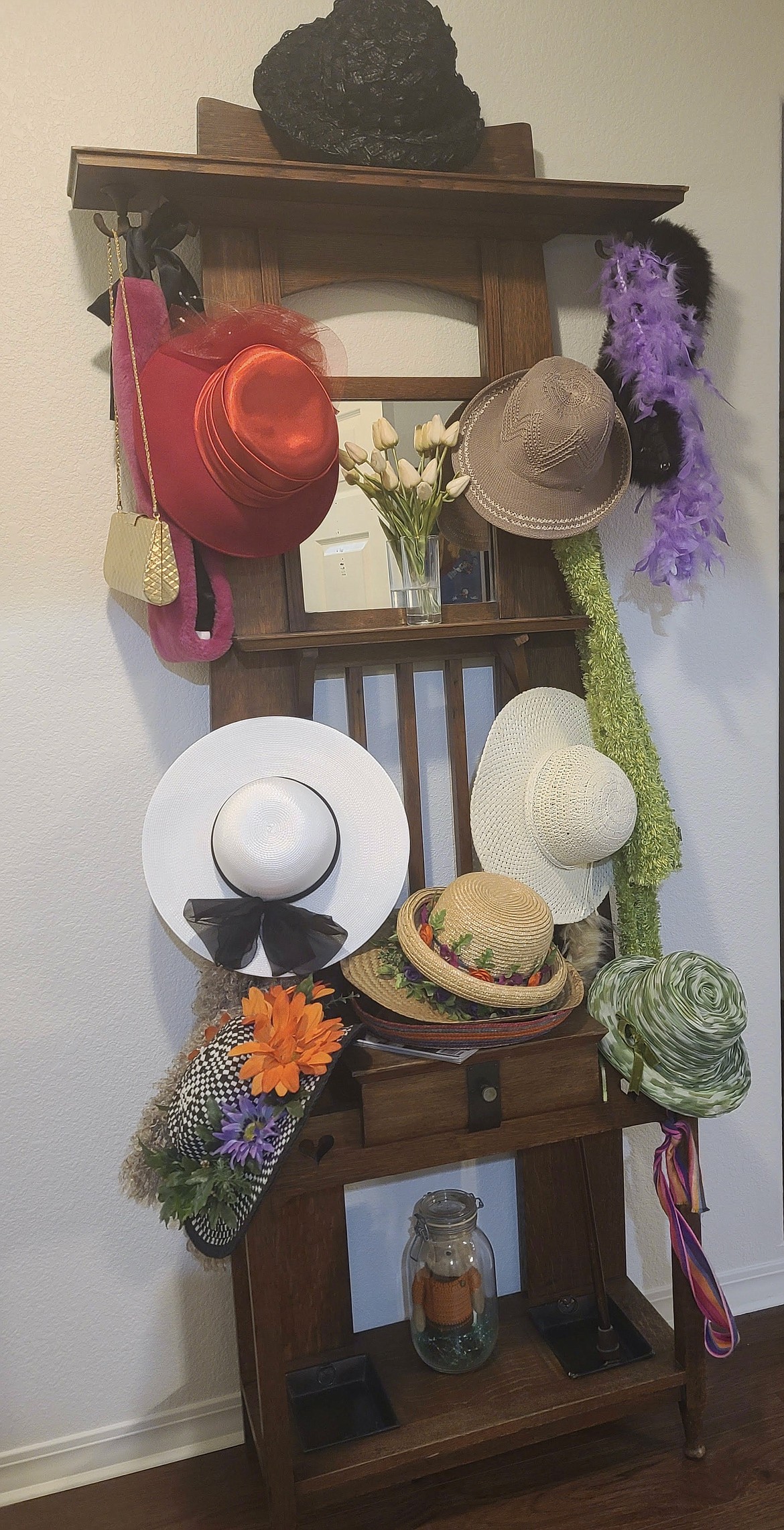 English umbrella stand right outside the Hill House English Tea Room with many of Vivienne' Montague's hats she loaned for the Oct. 29 tea party. (photo provided)