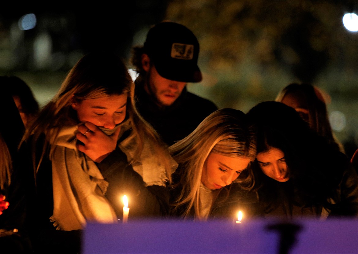 A vigil at Independence Point on Wednesday honored the four University of Idaho students who died in Moscow this week.