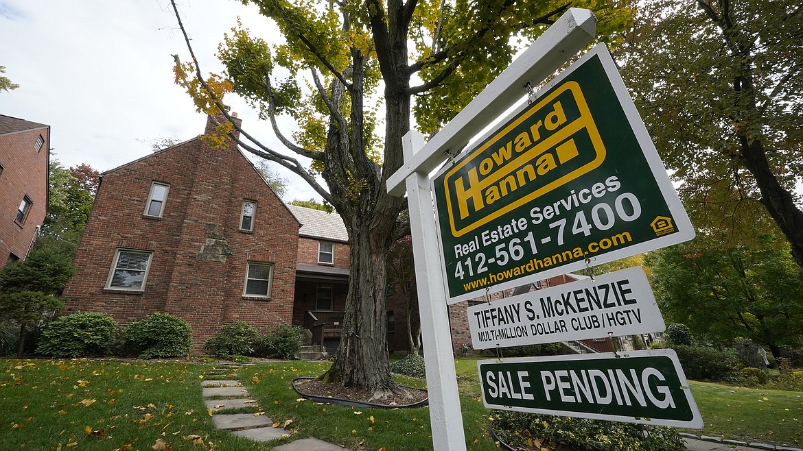 FILE - This is a home in Mount Lebanon, Pa., under contract, Oct. 17, 2022. Sales of previously occupied U.S. homes fell in September for the eighth month in a row, though the decline was the most modest yet since the housing market began to cool amid sharply higher mortgage rates. The National Association of Realtors said Thursday, Oct. 20, 2022 that existing home sales fell 1.5% last month from August to a seasonally adjusted annual rate of 4.71 million. (AP Photo/Gene J. Puskar, file)