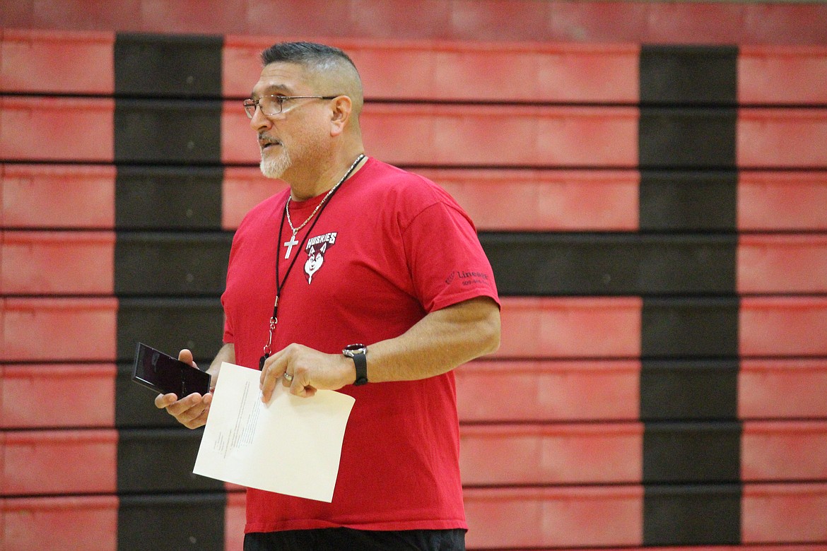 Othello girls basketball coach Adolfo Coronado gives instructions during the first night of practice for the 2022-23 season.