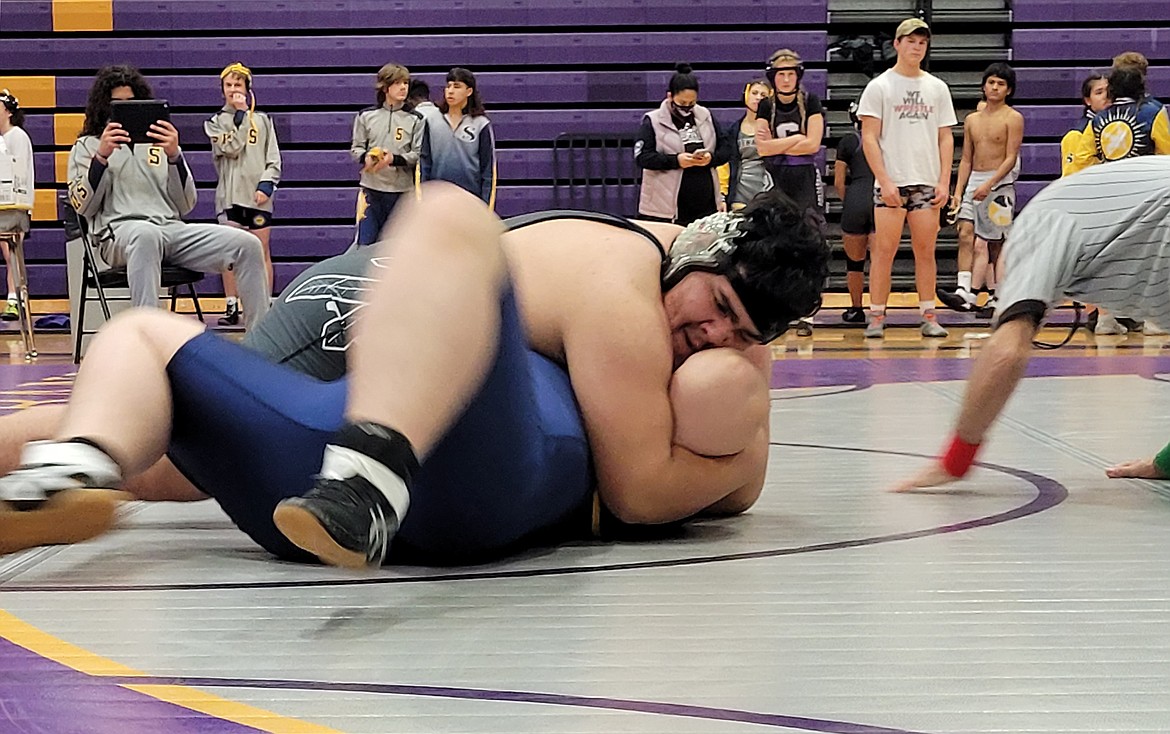 A Wahluke wrestler takes down an opponent during a meet last season.