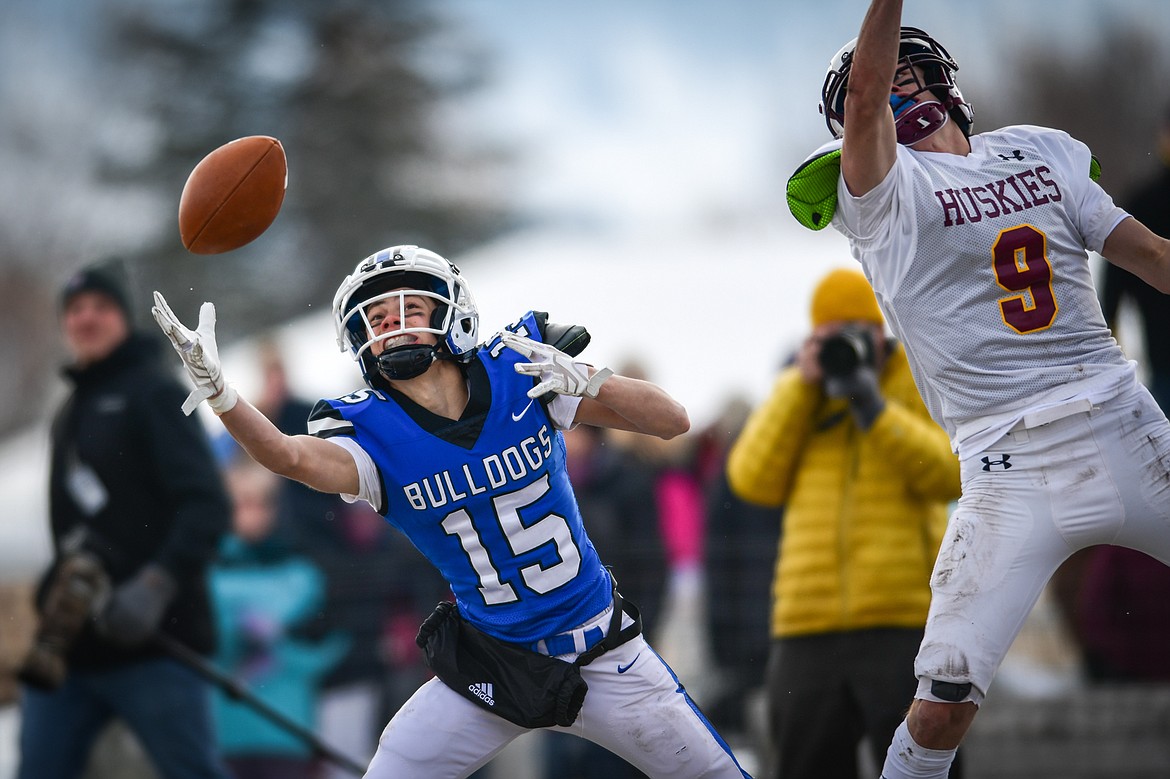 Mission wide receiver Titan Mansell (15) has a pass sail out of reach in the first quarter against Belt during the 8-man championship at St. Ignatius High School on Saturday, Nov. 19. (Casey Kreider/Daily Inter Lake)