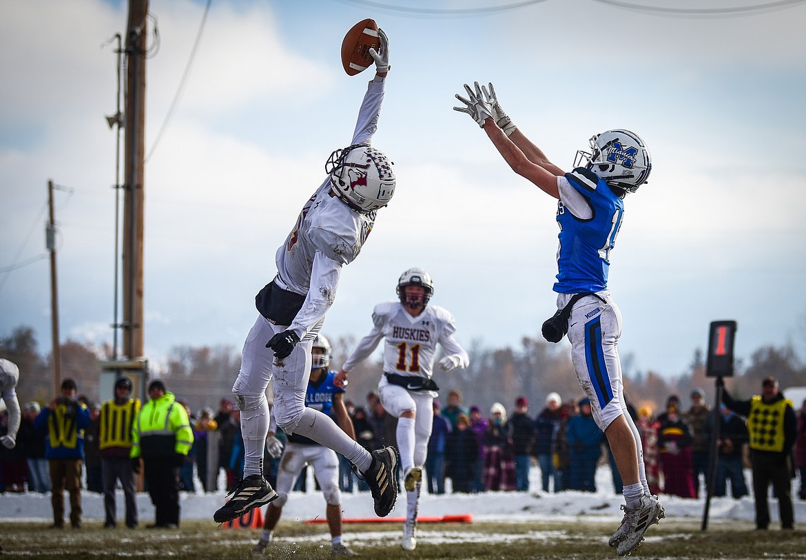Belt defensive back Bridger Vogl (23) intercepts a pass into the end zone on a two-point conversion in the first quarter against Mission during the 8-man championship at St. Ignatius High School on Saturday, Nov. 19. (Casey Kreider/Daily Inter Lake)