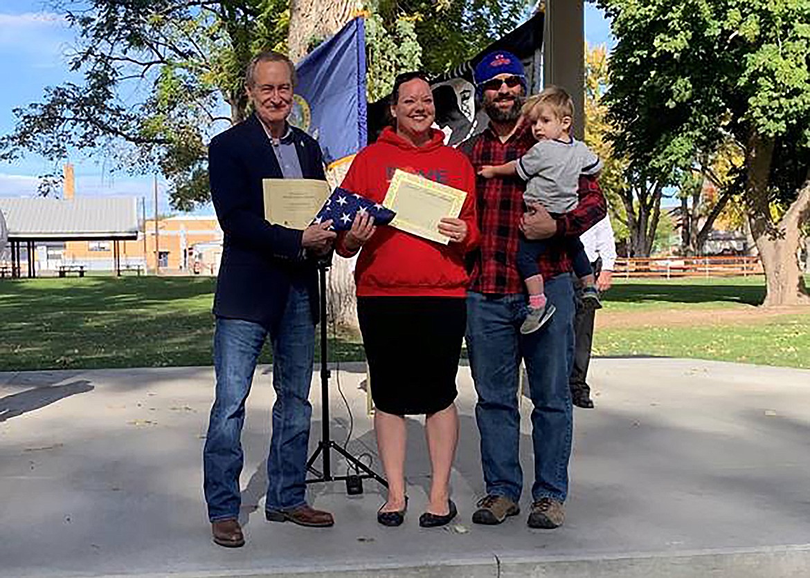 U.S. Sen. Mike Crapo presents Hayley Slaughter with the 2022 Spirit of Freedom: Idaho Veterans Service Award on Oct. 31, 2022. Haley’s husband, Travis Slaughter, who served in the U.S. Air Force for 20 years, and one of their three children are also pictured.