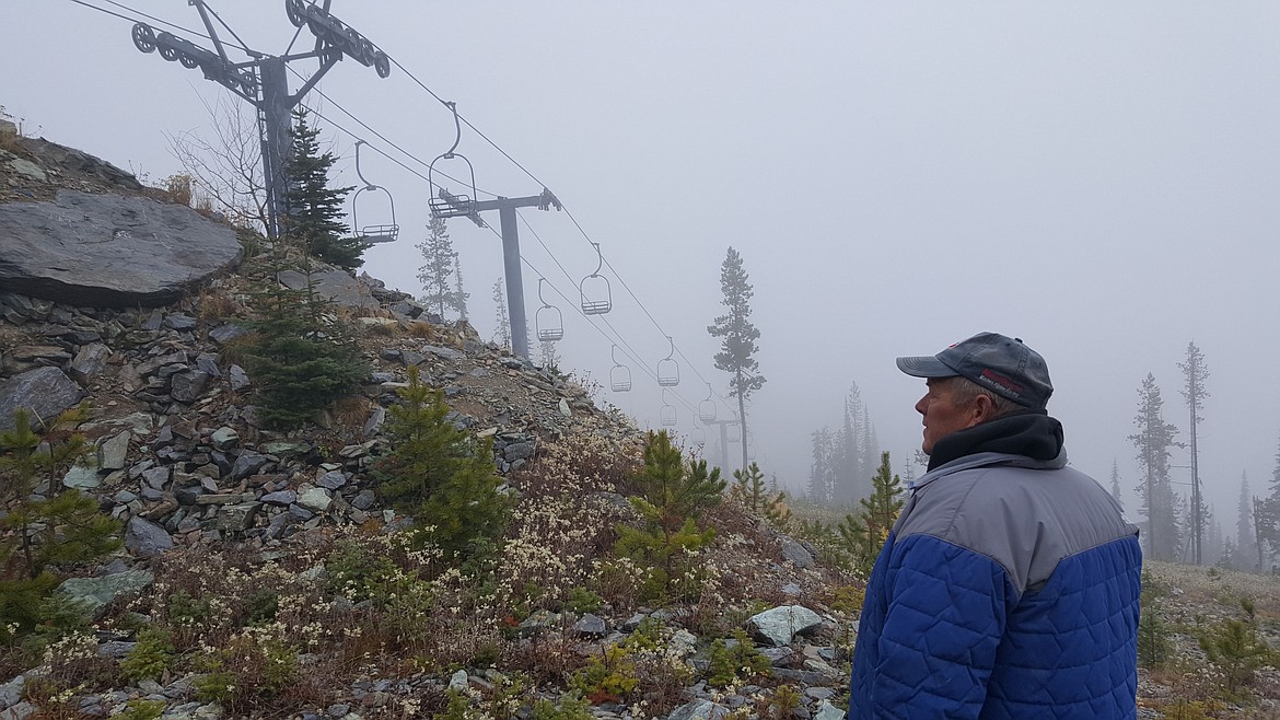 Blacktail Mountain Ski Area founder Steve Spencer examines a ski lift before the 2020 winter sports season. Spencer sold the ski area to Mission Ridge in 2021. (Photo courtesy of Blacktail Mountain Ski Area)