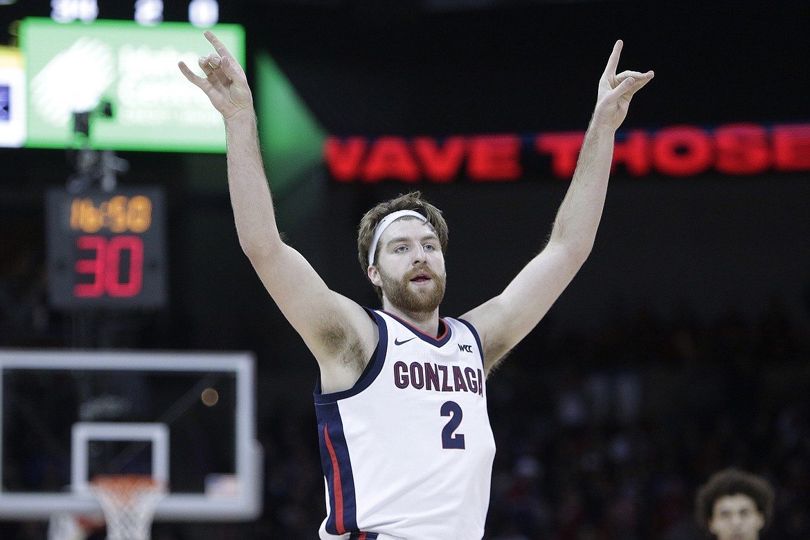 Gonzaga forward Drew Timme reacts after making a basket during the first half of an NCAA college basketball game, against Kentucky, Sunday, Nov. 20, 2022, in Spokane, Wash.