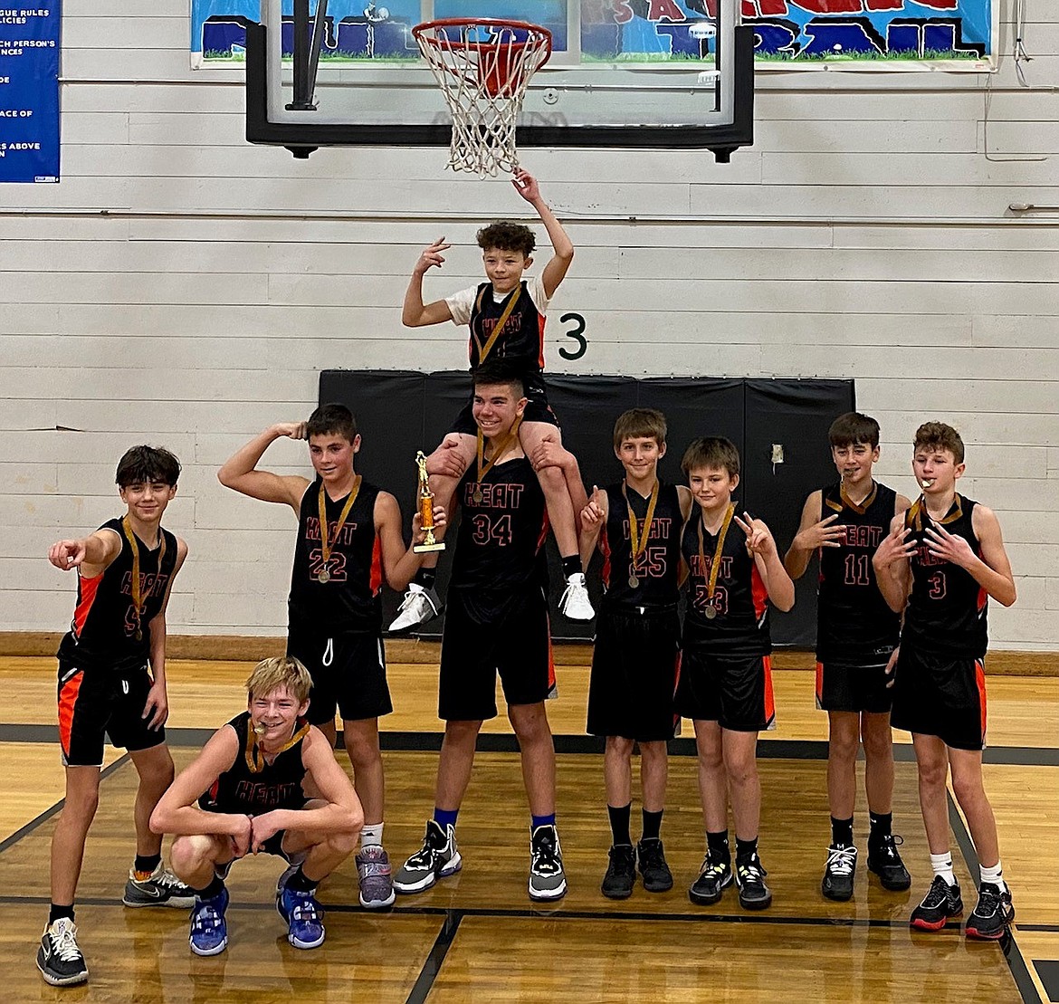 Courtesy photo
Attached is a picture of the Coeur d'Alene Heat seventh grade AAU boys basketball team, which won the River City Basketball Tournament held Nov. 11-12 in Post Falls. From left are Taytem Frazier, Landon Leveque, Quinn Murrell, Ty Ball, Tavion Norwood (on shoulders), Noah Perkins, John Groat, Cole Clyne and Nick Smith. Not pictured is Carson Munday.