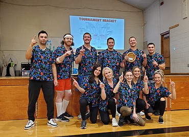 Team Ballsagna celebrates a victory after winning the Wild Turkey Dodgeball Tournament held in the Mullan Trail Elementary School gym Friday night in Post Falls.