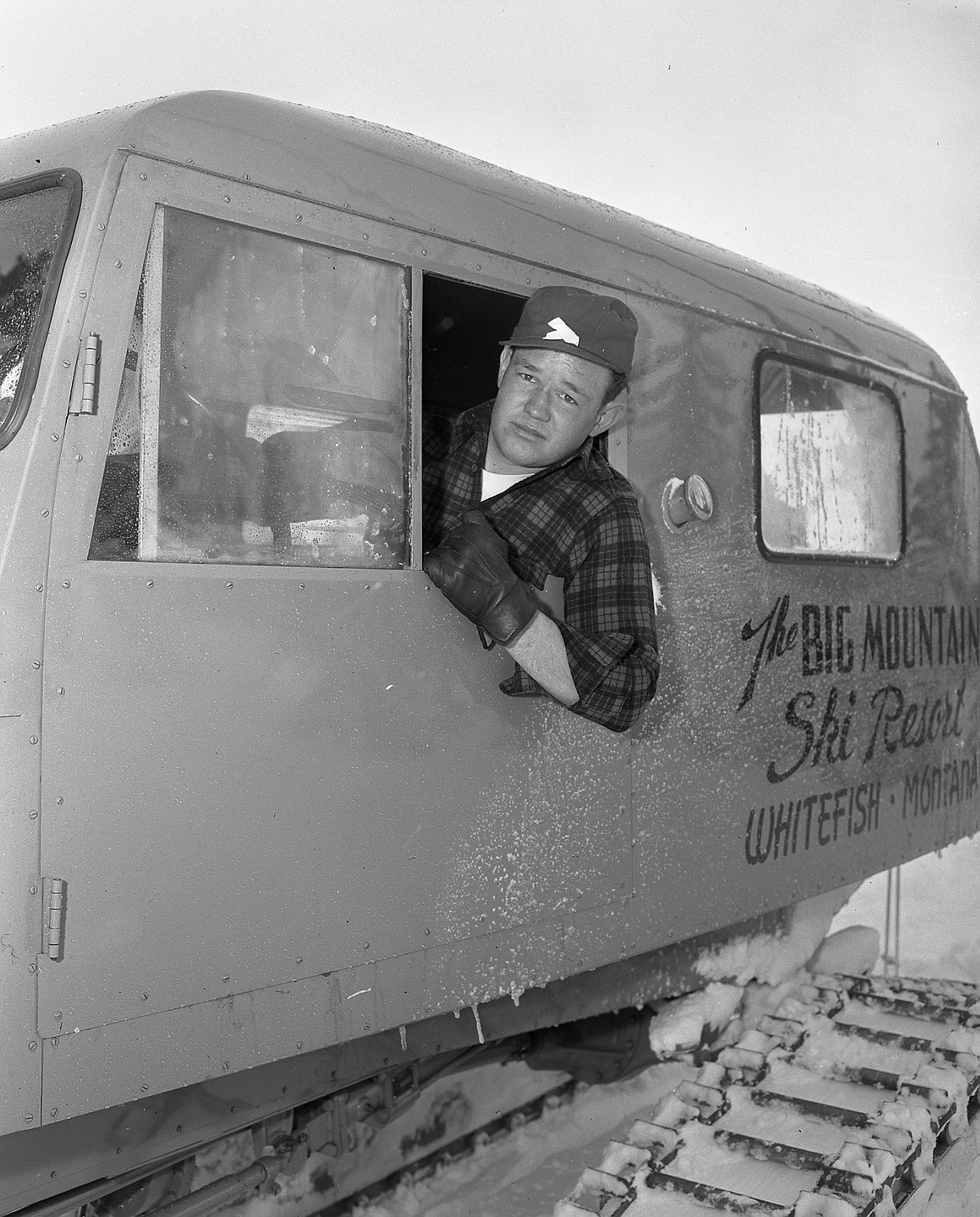 Bill Tubbs operates a snowcat on Big Mountain on Feb. 12, 1956. (Mel Ruder/Hungry Horse News)