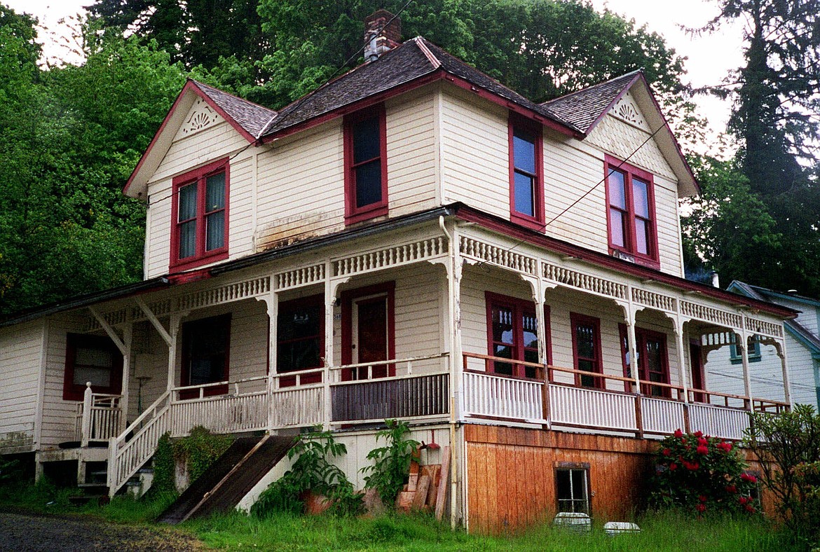 The house featured in the Steven Spielberg film "The Goonies" is seen in Astoria, Ore., on May 24, 2001. The Victorian home, built in 1896 with sweeping views of the Columbia River as it flows into the Pacific Ocean, is now for sale has been listed with an asking price of $1.7 million. Since the film was released in 1985, fans have flocked to the home, and the owner has long complained of constant crowds and trespassing. (AP Photo/Stepanie Firth, File)