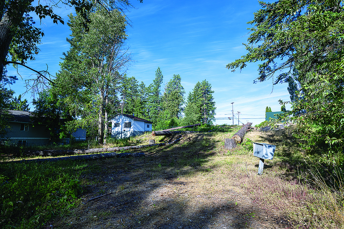 The lot in Columbia Falls that is slated to become home to the rebuilt and reconfigured Swiss Apartments is shown in this file photo. (File photo)