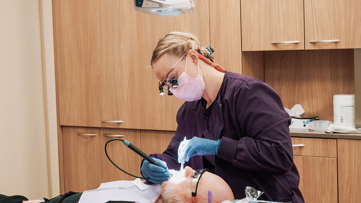 NIC dental hygiene student Jessica Reineccius examines veteran and former NIC student Trevor Cardigan on Thursday, Nov. 10 at Winton Hall on NIC’s main campus in Coeur d’Alene.