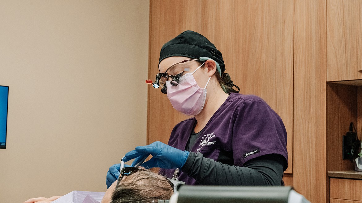 NIC dental hygiene student Kayla Strange examines a patient as part of Operation Veteran Smiles on Thursday, Nov. 10 at Winton Hall on NIC’s main campus in Coeur d’Alene.