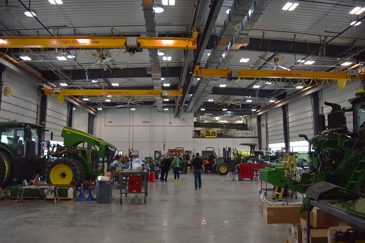 Several tractors sit in the repair bays of RDO Equipment’s new shop in Moses Lake.