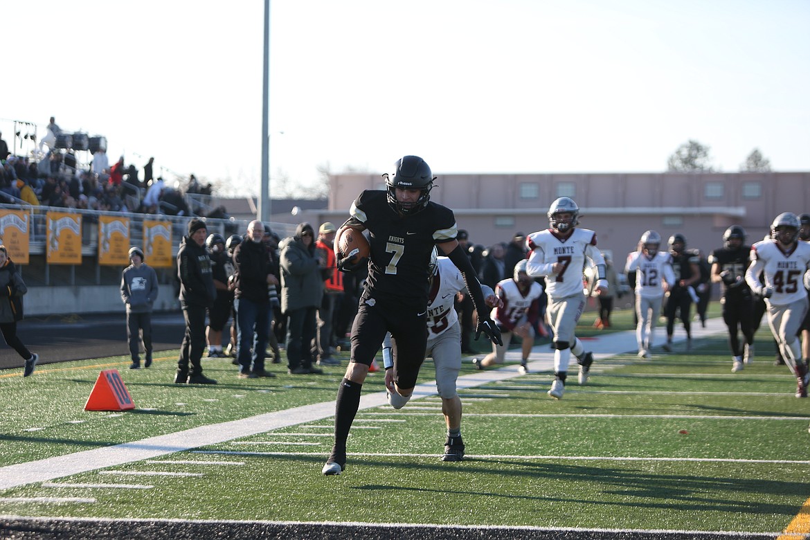 Royal receiver Edgar De La Rosa returns a punt against Montesano in the 1A state qurterfinals.