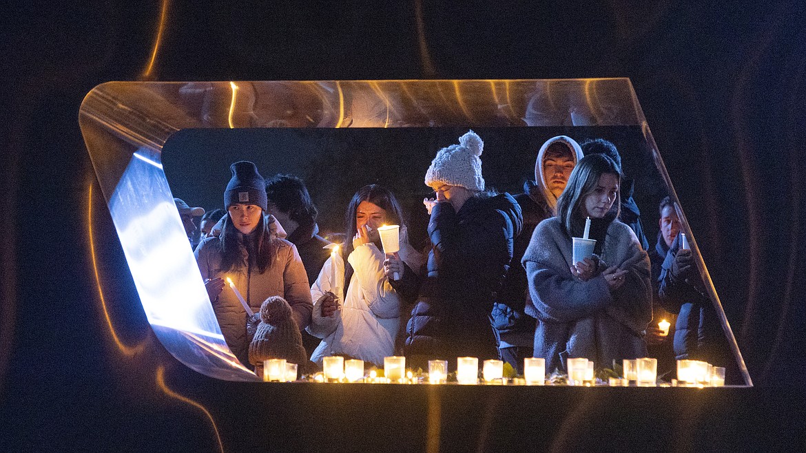 Boise State University students, along with people who knew the four University of Idaho students who were found killed, pay their respects at a vigil on the Boise State campus on Nov. 17.