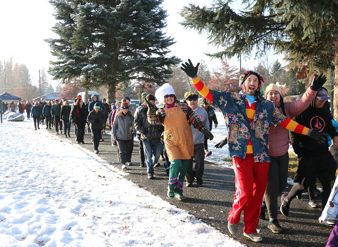 Many Turkey Trot participants, such as this trio, came dressed with Thanksgiving-themed hats and outfits. This year's event was the 15th annual iteration and was co-sponsored by the city of Sandpoint and Litehouse YMCA to raise funds and donations for the Bonner Community Food Bank.