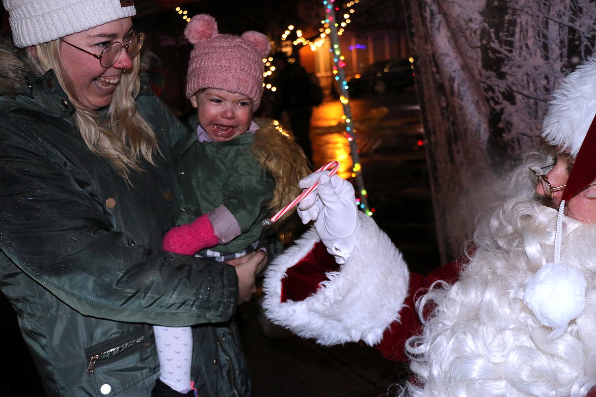 Not everyone was happy to see Santa as one youngster burst into tears when it was her turn to visit with the Jolly Old Elf.