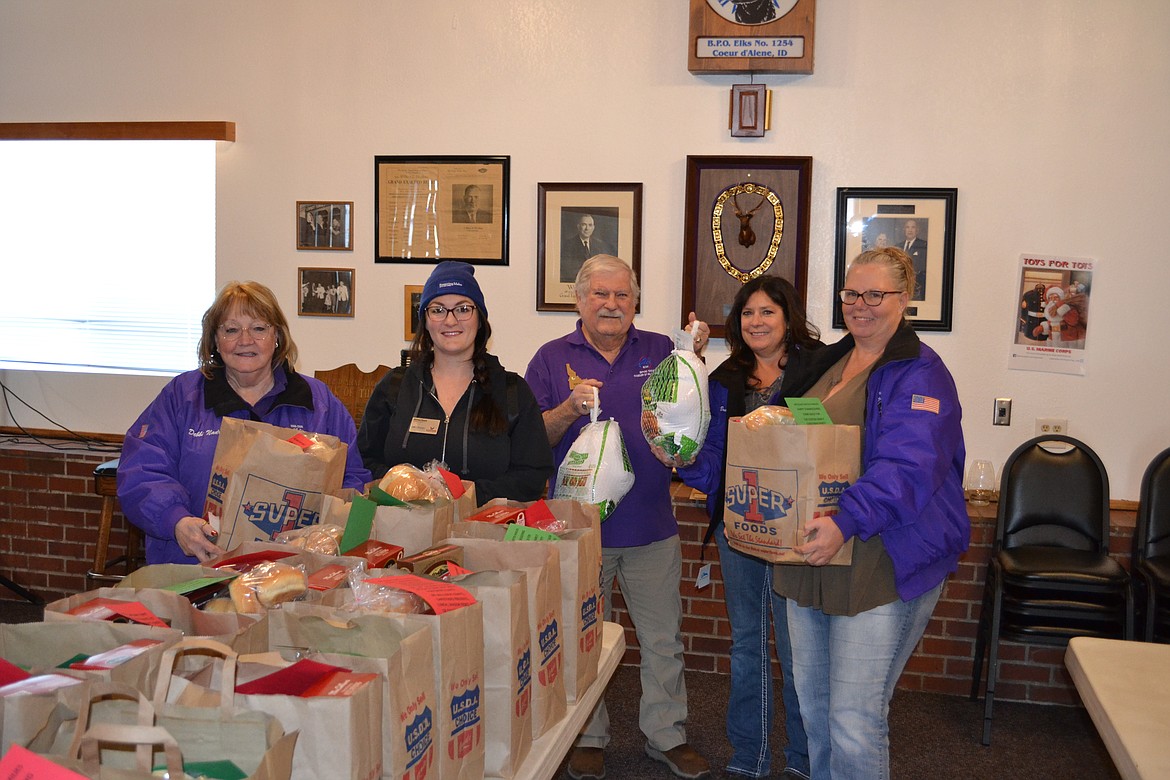 Coeur d'Alene Elks Lodge 1254 recently donated full Thanksgiving meals for 70 foster families in the community. The total cost of the meals was roughly $5,000. Pictured, from left: Debbi Nadrchal, past exalted ruler; Hailee Guyll, assistant Thanksgiving foster family recruitment coordinator; Bob Shaw, Idaho Elks State Association President; Robbin Moore, Elks board chair; Sandy Wessling, Thanksgiving coordinator.