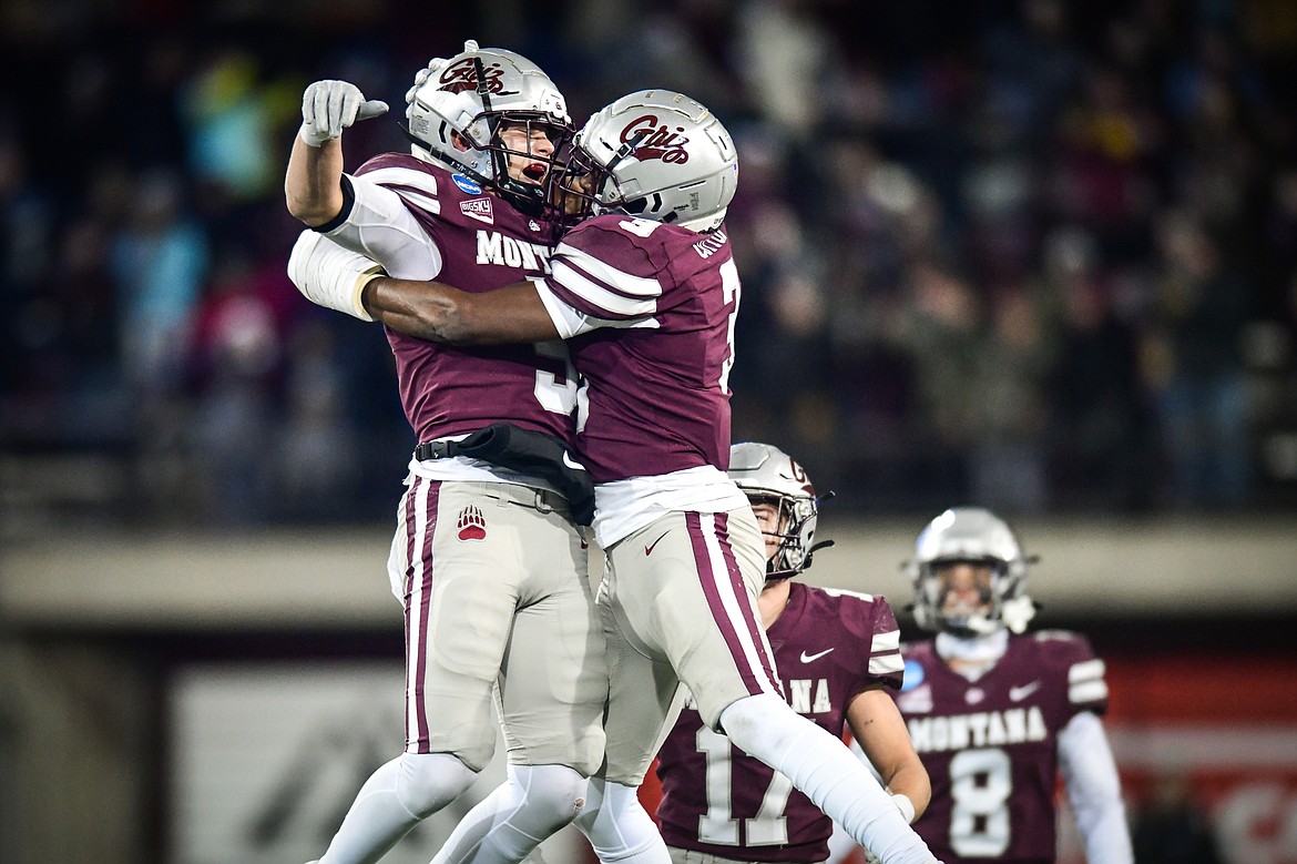 Grizzlies safety Garrett Graves (5) celebrates with Trajon Cotton (3) after intercepting a pass in the fourth quarter of an FCS playoff game against Southeast Missouri State at Washington-Grizzly Stadium on Saturday, Nov. 26. (Casey Kreider/Daily Inter Lake)