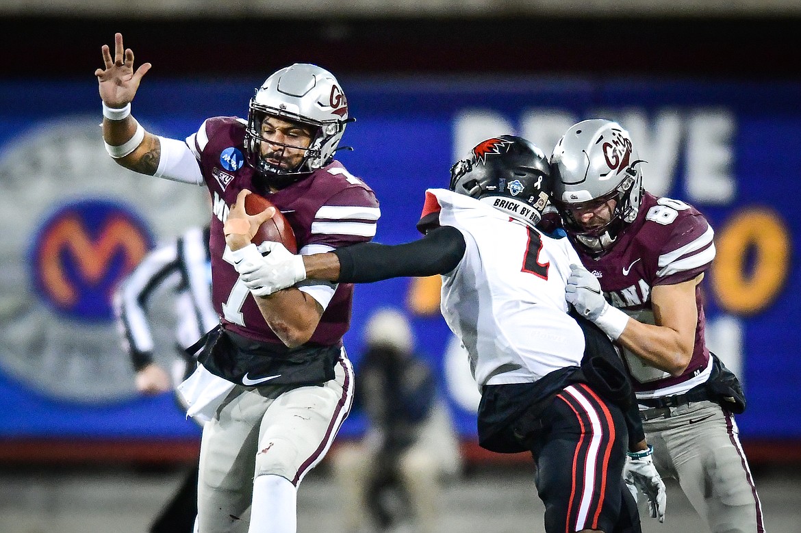 Grizzlies quarterback Lucas Johnson (7) picks up yardage on a run in the third quarter of an FCS playoff game against Southeast Missouri State at Washington-Grizzly Stadium on Saturday, Nov. 26. (Casey Kreider/Daily Inter Lake)