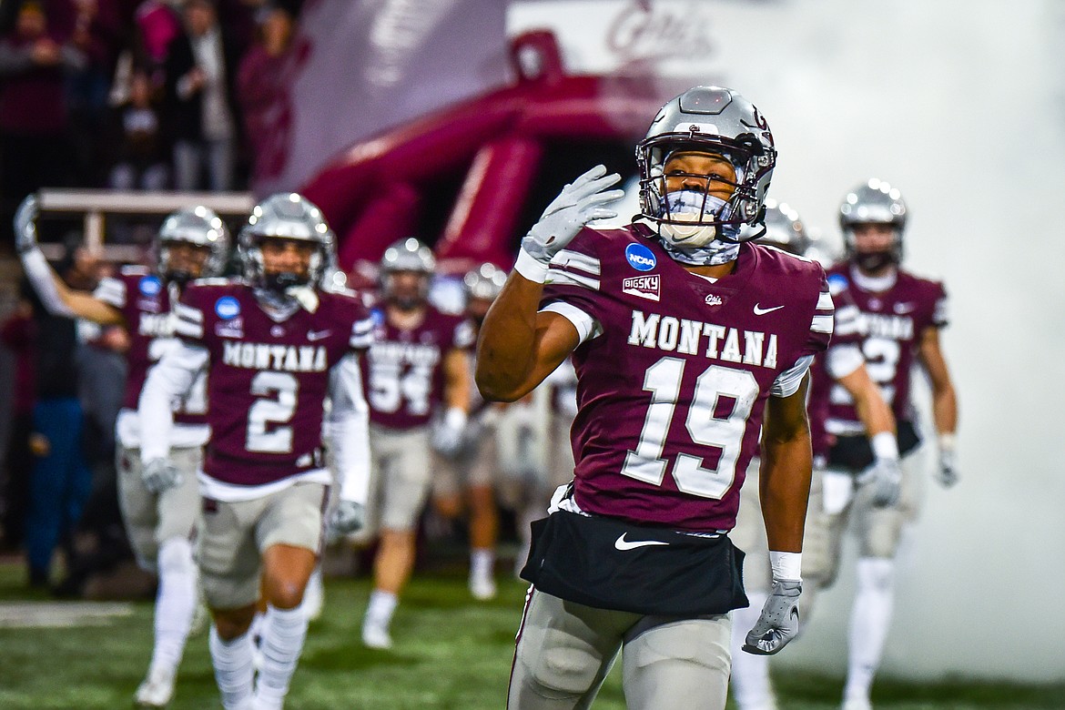 Grizzlies wide receiver Malik Flowers (19) and teammates head out onto the field before an FCS playoff game against Southeast Missouri State at Washington-Grizzly Stadium on Saturday, Nov. 26. (Casey Kreider/Daily Inter Lake)