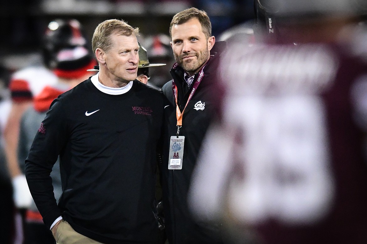 Montana Grizzlies head coach Bobby Hauck speaks with Seth Bodnar, President of the University of Montana, before an FCS playoff game against Southeast Missouri State at Washington-Grizzly Stadium on Saturday, Nov. 26. (Casey Kreider/Daily Inter Lake)
