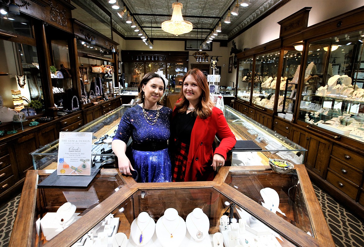 Jane Clark, right, and Arian Gravelle of Clark's Diamond Jewelers smile at work on Wednesday. They are hoping for lots of snow on Jan. 7, the date selected for the Sherman Avenue store's "Let It Snow" campaign.
