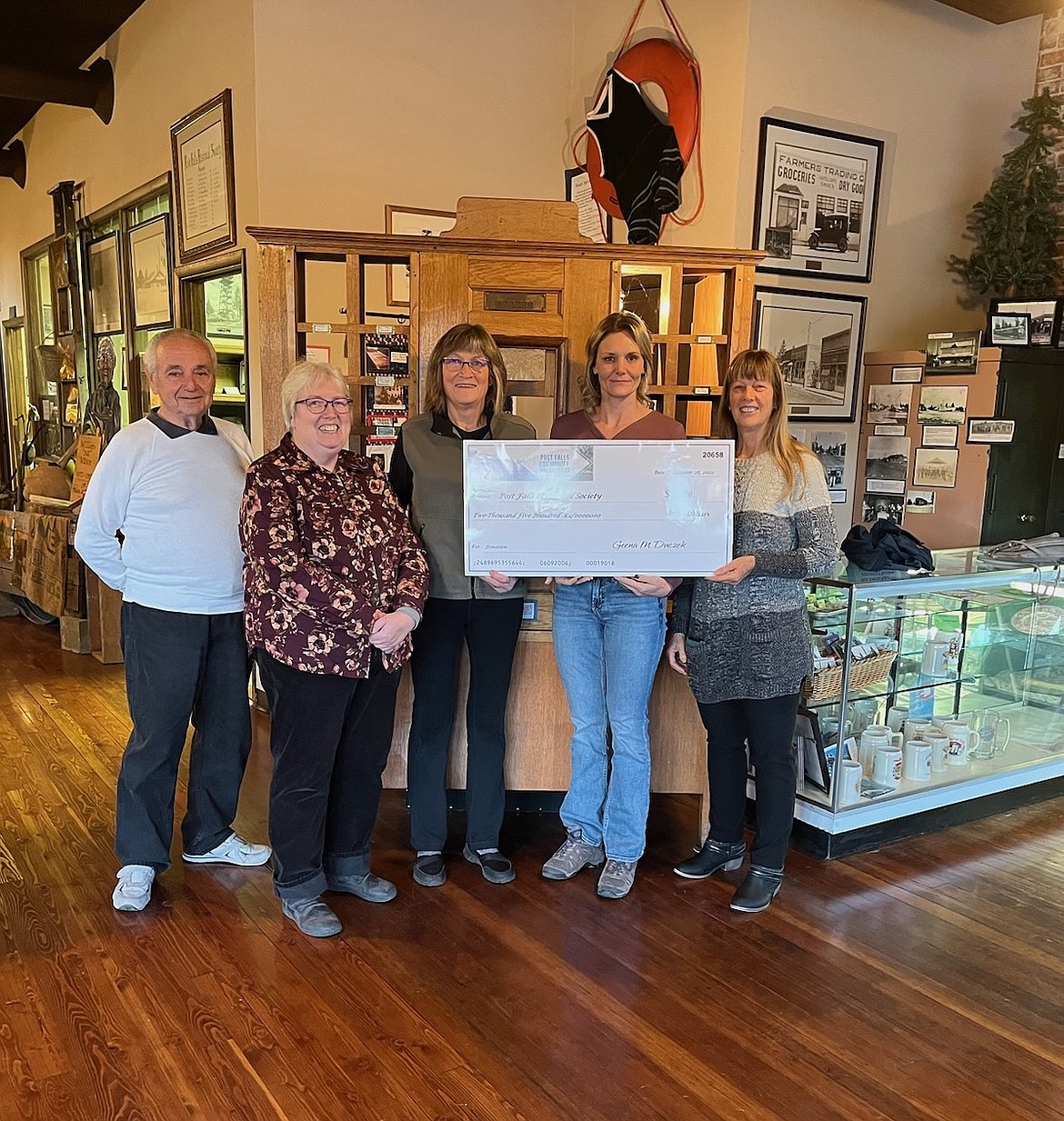 The Post Falls Community Volunteers donated $2,500 to the Post Falls Historical Society as part of more than $10,000 they gifted to other causes in the area. From left: Ted Fredekind (emeritus), Cindy Mead and Kim Brown of the society; and Post Falls Community Volunteers Geena Duczek and Lisa Houston.