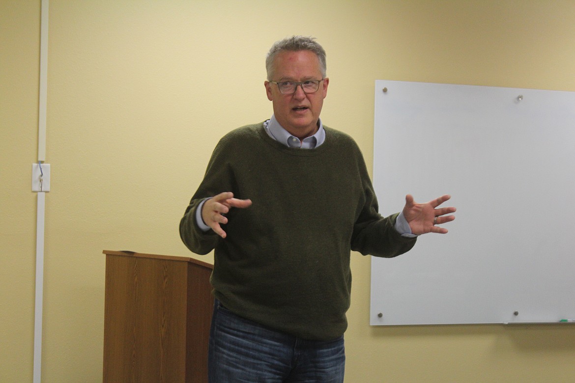 Joe Kunkel updates members of the Quincy Valley Medical Center board on progress toward the new hospital during a Monday meeting.