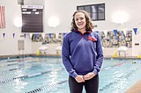 Caudill back at the helm of swim team