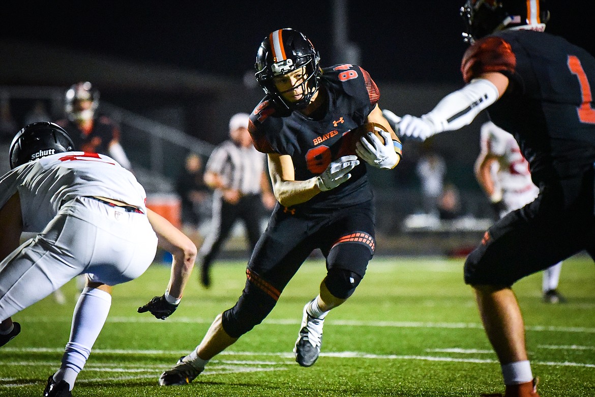 Flathead tight end Gabe Sims (84) scores a touchdown on a reception in the third quarter against Missoula Hellgate at Legends Stadium on Friday, Sept. 23. (Casey Kreider/Daily Inter Lake)