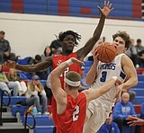 PREP BOYS BASKETBALL: Ferris a tall task for Coeur d'Alene in opener