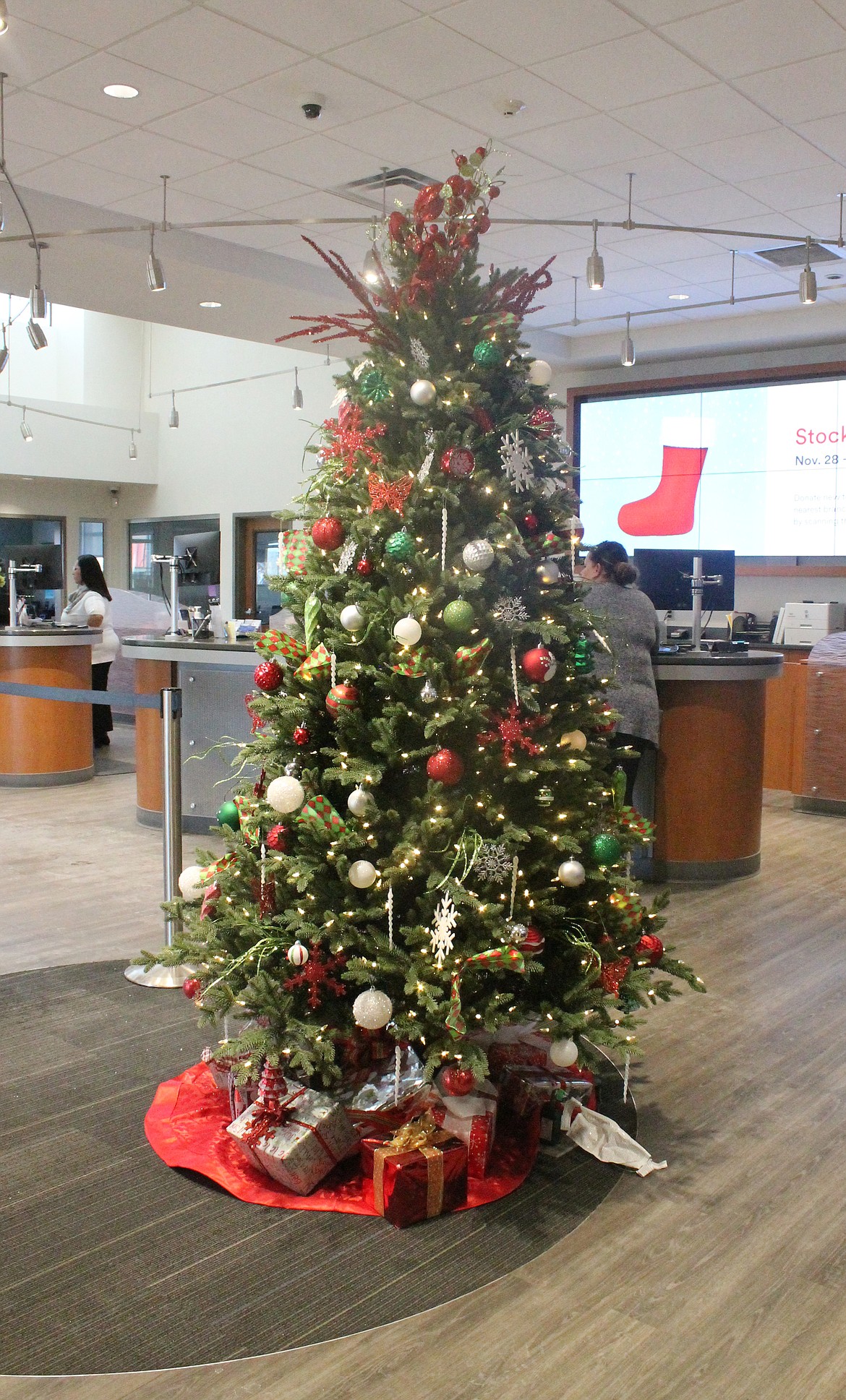 The tree is up at Gesa Credit Union in Moses Lake. Gesa began its Stock-the-Sock toy drive Thursday afternoon, although the giant stocking used to collect the toys hadn’t arrived yet.