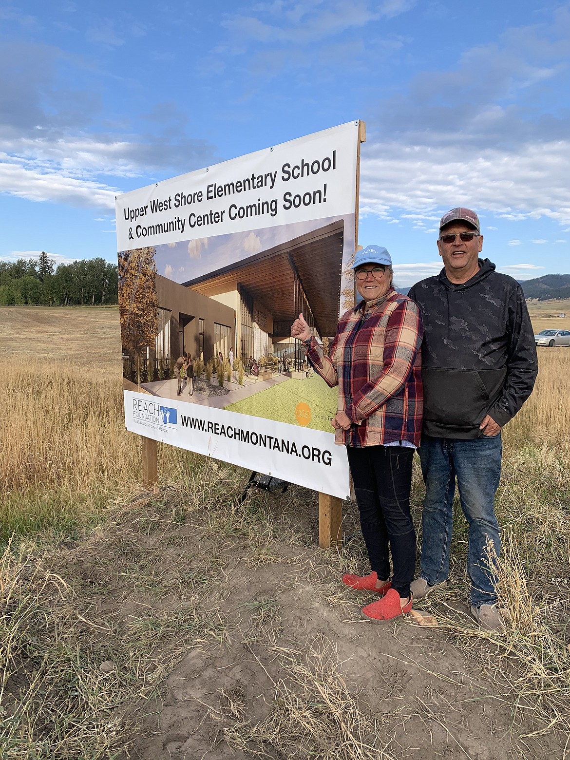 Members of the Upper West Shore School District Board of Trustees Greg Simonson and Monica Simonson pose on the future site of Dayton Elementary School's replacement building.(Courtesy photo)