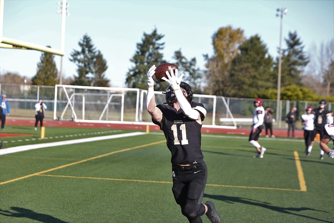 Receiver Lance Allred hauls in a six-yard touchdown in the fourth quarter against Mount Baker.