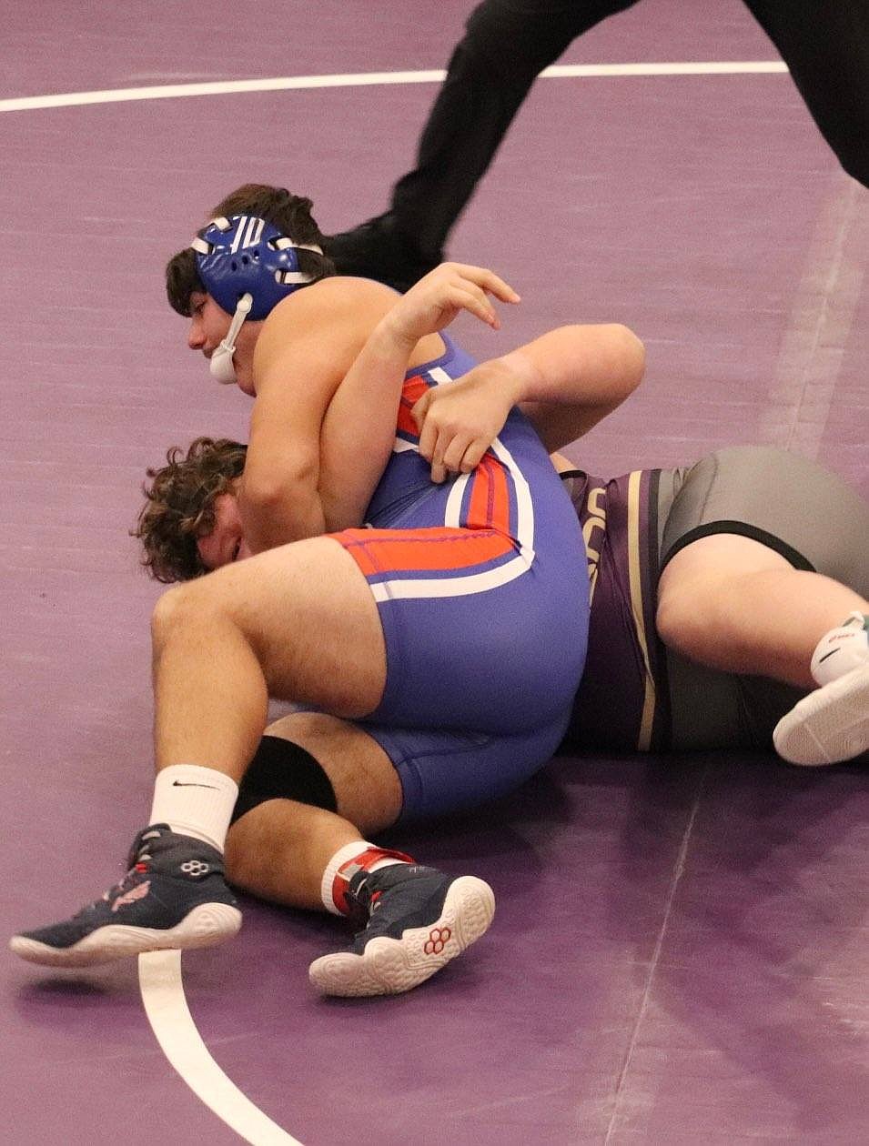 Superior's Chandon Vulles has the upper hand in his consolation finals match this weekend at the Owen Invitational in Polson. Vulles placed third in the 285 pound category. (Photo by Kami Milender)